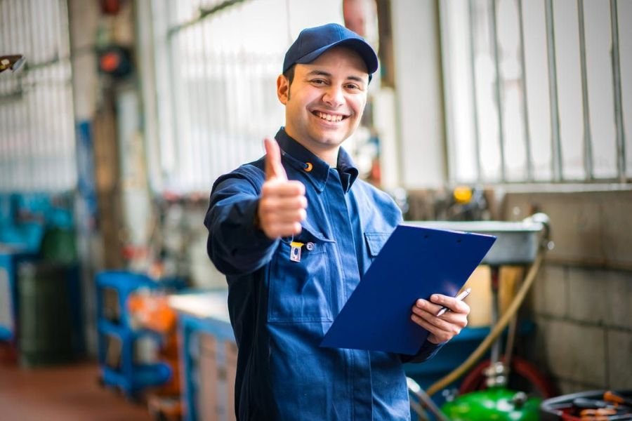 A man showing thumbs up showing best 7 tune up kit components for business